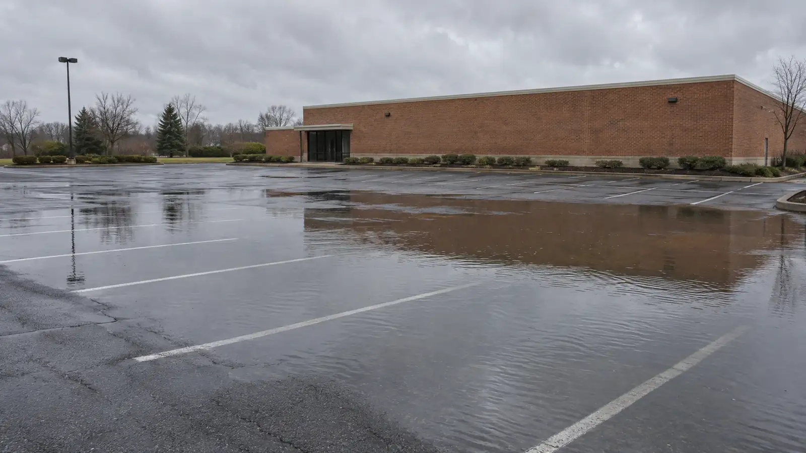 Before: a parking lot with ponded water